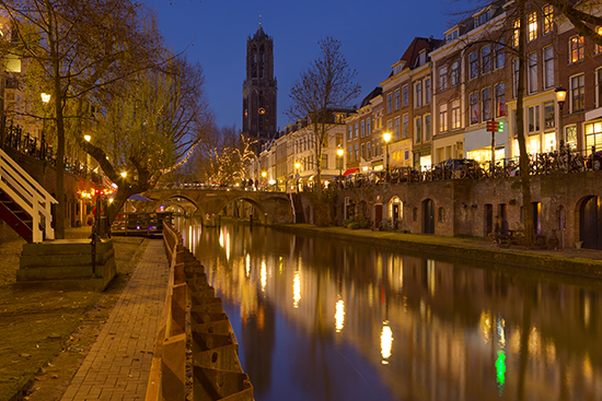 Canal and Dom church in Utrecht, The Netherlands at night