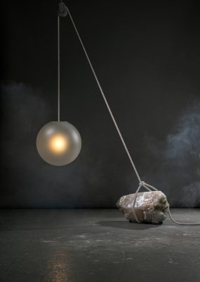 Jesse Visser, Beacon of Light, Light Sculpture,  Madagascar Quartz boulder, sandblasted glass, natural rope, steel pulley. Gallery Mia Karlova 